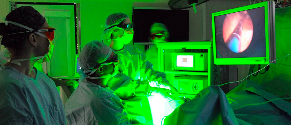Équipe medica in sala operatoria con Greenlight